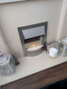 fireplace surround with an electric fan heater