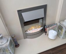 fireplace surround with an electric fan heater