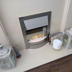 fireplace surround with an electric fan heater