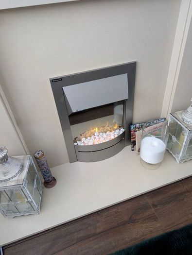 fireplace surround with an electric fan heater