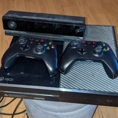 Xbox One console with Kinect and two controllers
