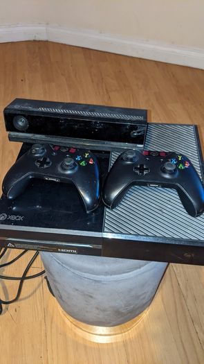 Xbox One console with Kinect and two controllers
