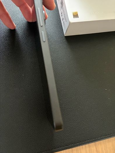 Xiaomi 14T phone with earbuds