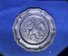 Heavy pewter decorative plate, St. George and the dragon.