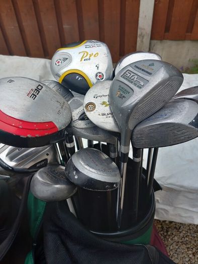 A selection of golf clubs and bags. NOT SELLING SEPARATE