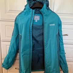 Regatta green/teal raincoat. Age 11-12. Perfect condition, brand new. Never worn