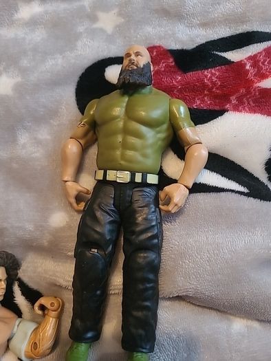 13 WWE wrestling figures