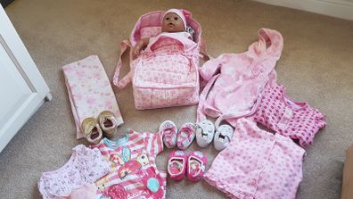 Doll, Carrycot, quilt and clothes