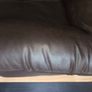 dark brown faux leather armchair. Image 7
