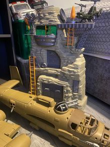 Action figure base and giant jet