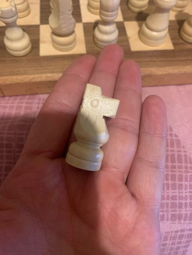 Boxed wooden chess board, prices and checkers set