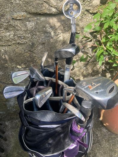 Golf cart - powered. Clubs, bag, balls etc