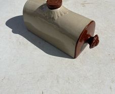 Antique delph hot water bottle