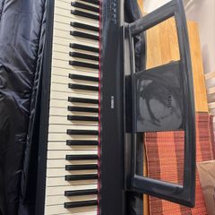 Yamaha keyboard with Stagg gig bag