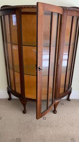 mahogany half moon cabinet