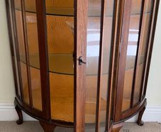 mahogany half moon cabinet