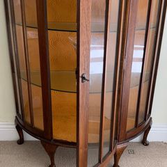 mahogany half moon cabinet
