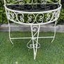 A vintage retro kitsch set of demilune wrought iron tables with glass toos c1950 Image 2