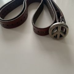 Vintage 1970's Thin Tooled Leather Peace Belt.