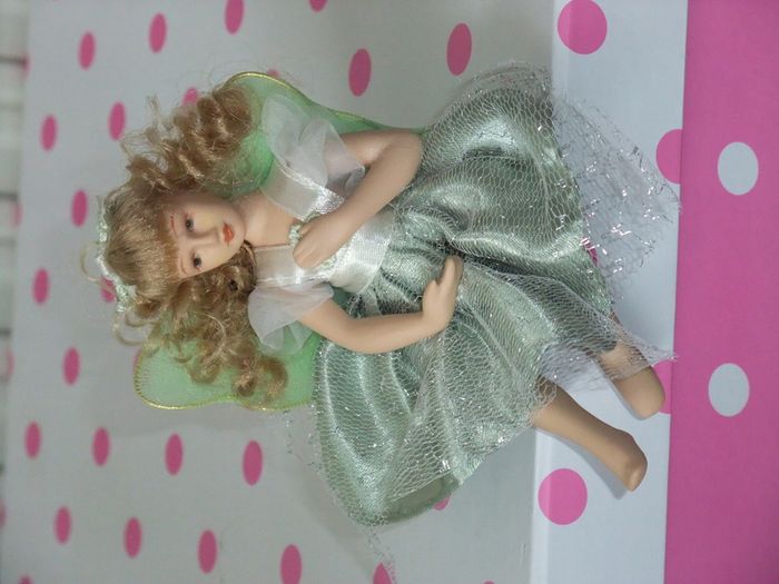 Two Small Porcelain Dolls