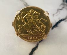 Half sovereign ring