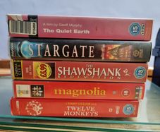 5 x VHS tapes (The Quiet Earth, Stargate, The Shawshank Redemption, Magnolia, Twelve Monkeys)