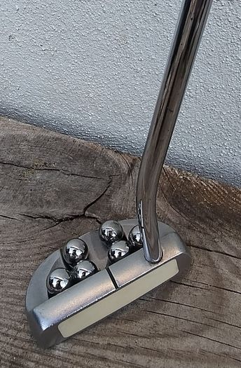 Putting with Balls