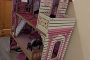 Large dollhouse with furniture and accessories