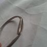 Sculptural sterling silver bangle with three tiny diamond accents. Image 2