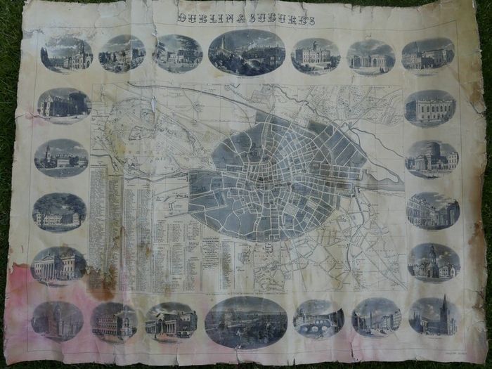Antique DUBLIN. Map of Dublin & Suburbs with 22 vignettes of Dublin landmarks. Published by Edward Heffernan, 1st June, 1868, 12 Charleville Road, Rathmines. 28" x 22,5". Linen backed. Frayed at edges