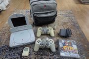 PS1 Slim with Screen, bag and game