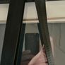 Red crossbody bag, adjustable shoulder strap. Image 4