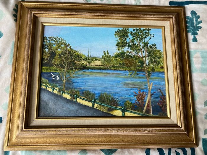 picture oil on board painting. Features a serene scene