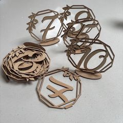 Table numbers, cut out from wood