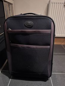 Black suitcase with brown trim