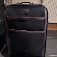 Black suitcase with brown trim