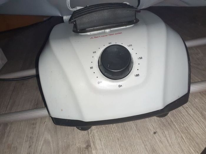 Heated clothes dryer