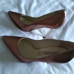 Buffalo rose gold stilettos