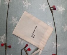 Isabel Marant brass and tassel necklace duo