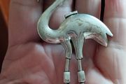 Large flamingo brooch.