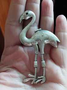 Large flamingo brooch.