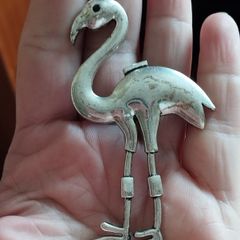 Large flamingo brooch.