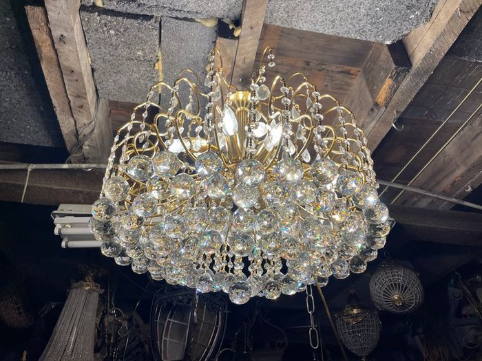 There is about 80 Crystal balls on this chandelier.