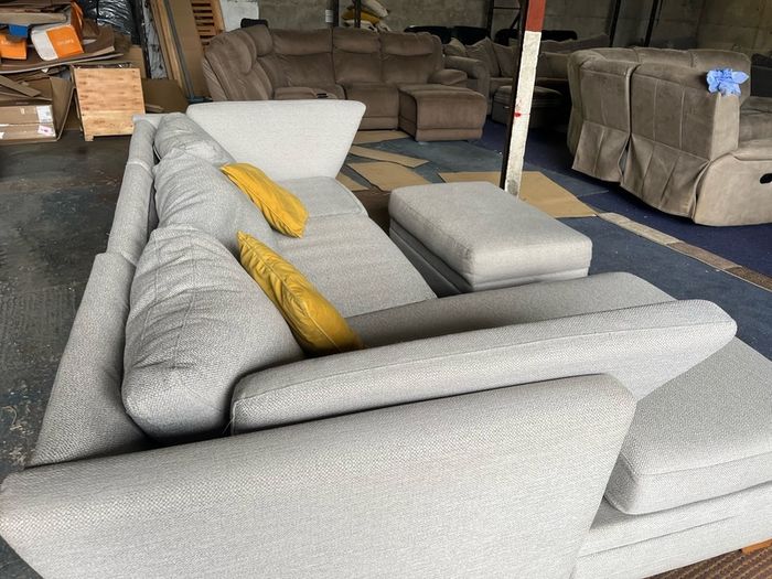 Grey corner sofa with matching footstool