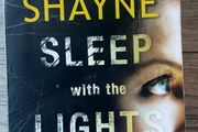Sleep with the light on. Maggie Shayne