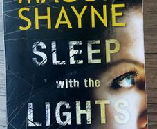 Sleep with the light on. Maggie Shayne