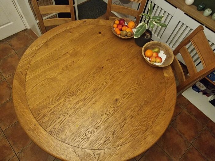 Round oak table with chairs