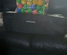 travel cot and balls
