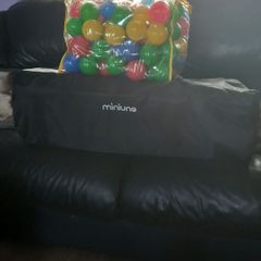travel cot and balls
