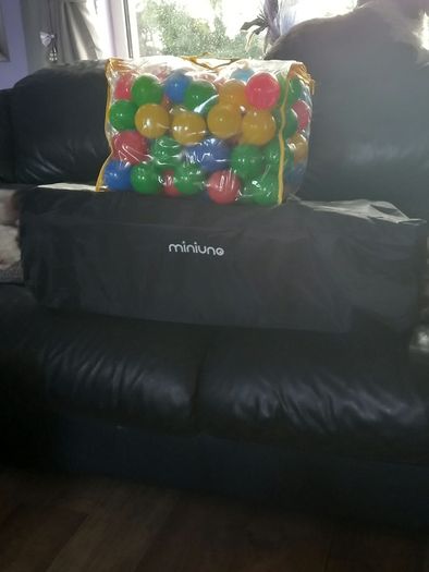 travel cot and balls